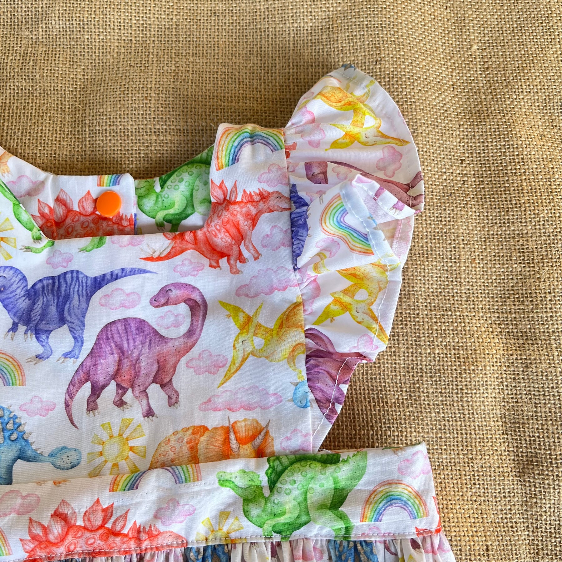 Handmade toddler pinafore / dress | Bright Dinosaurs