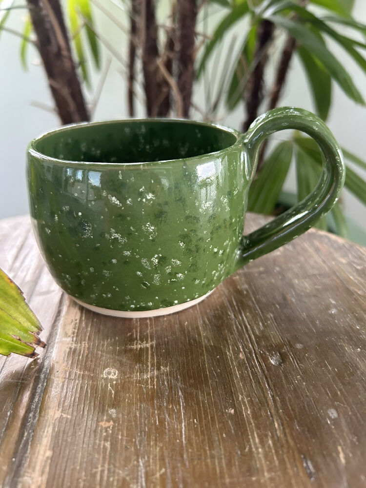 Green pottery mug