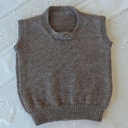 Hand knit sleeveless vest. wool, size 2. Free post