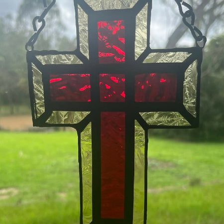 Red stained glass cross