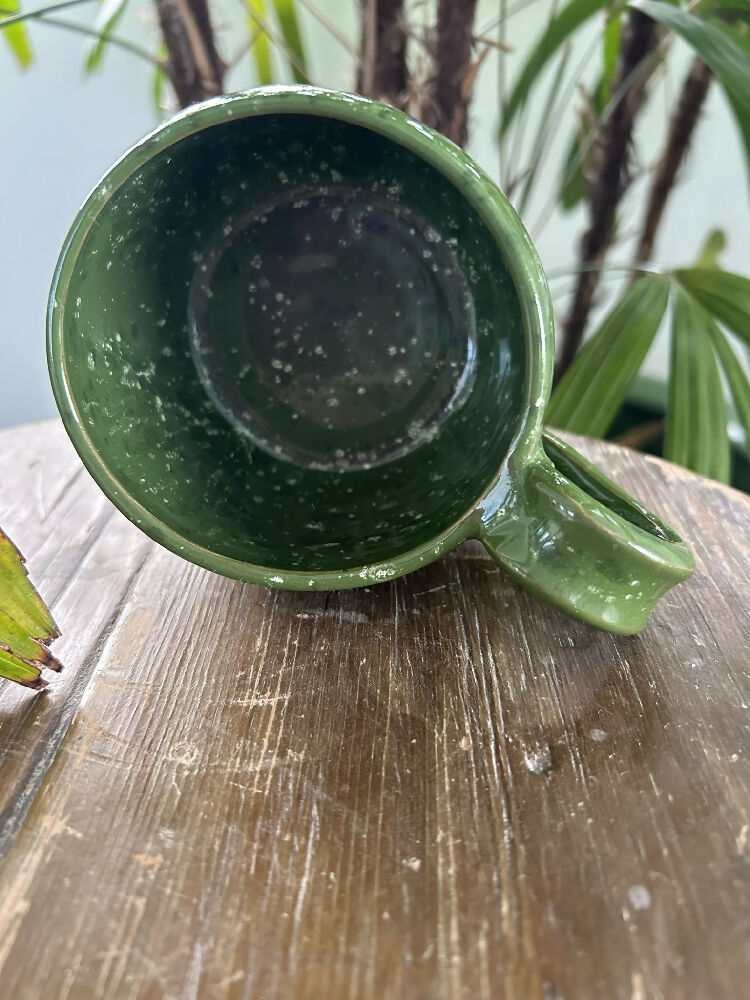Green pottery mug