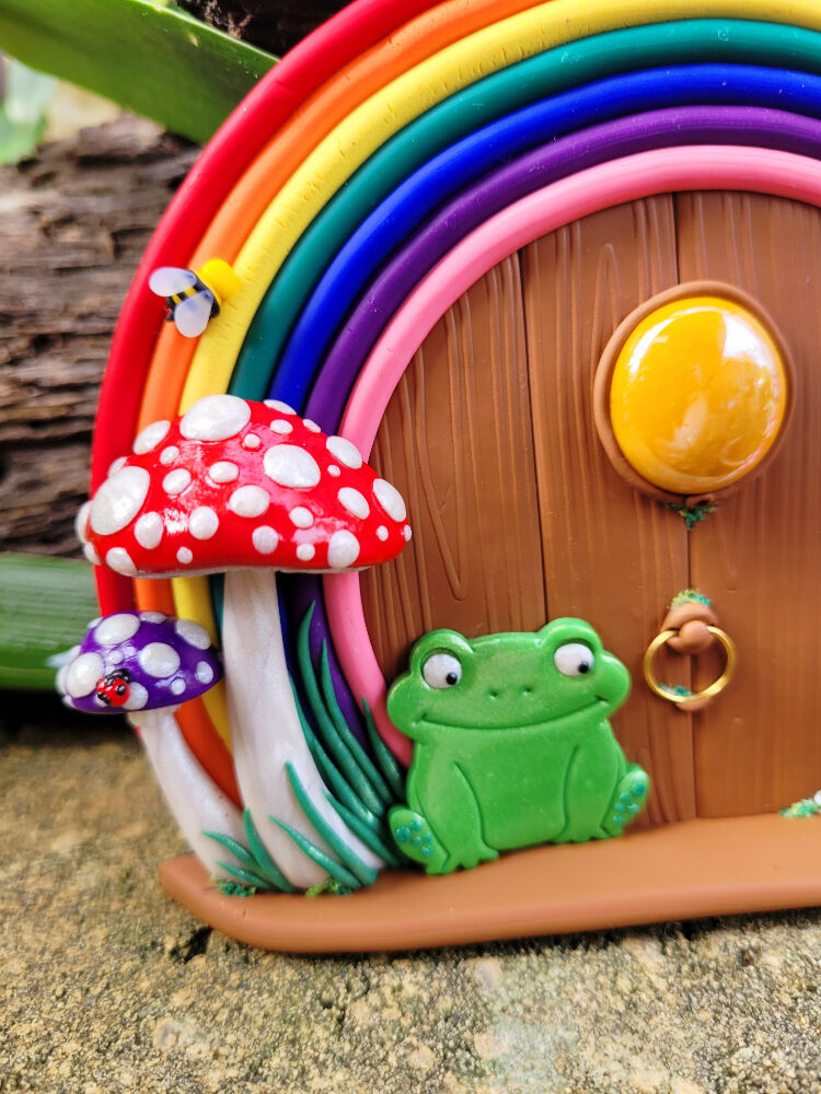 Cottagecore Mushroom and Rainbow Fairy door with a happy frog
