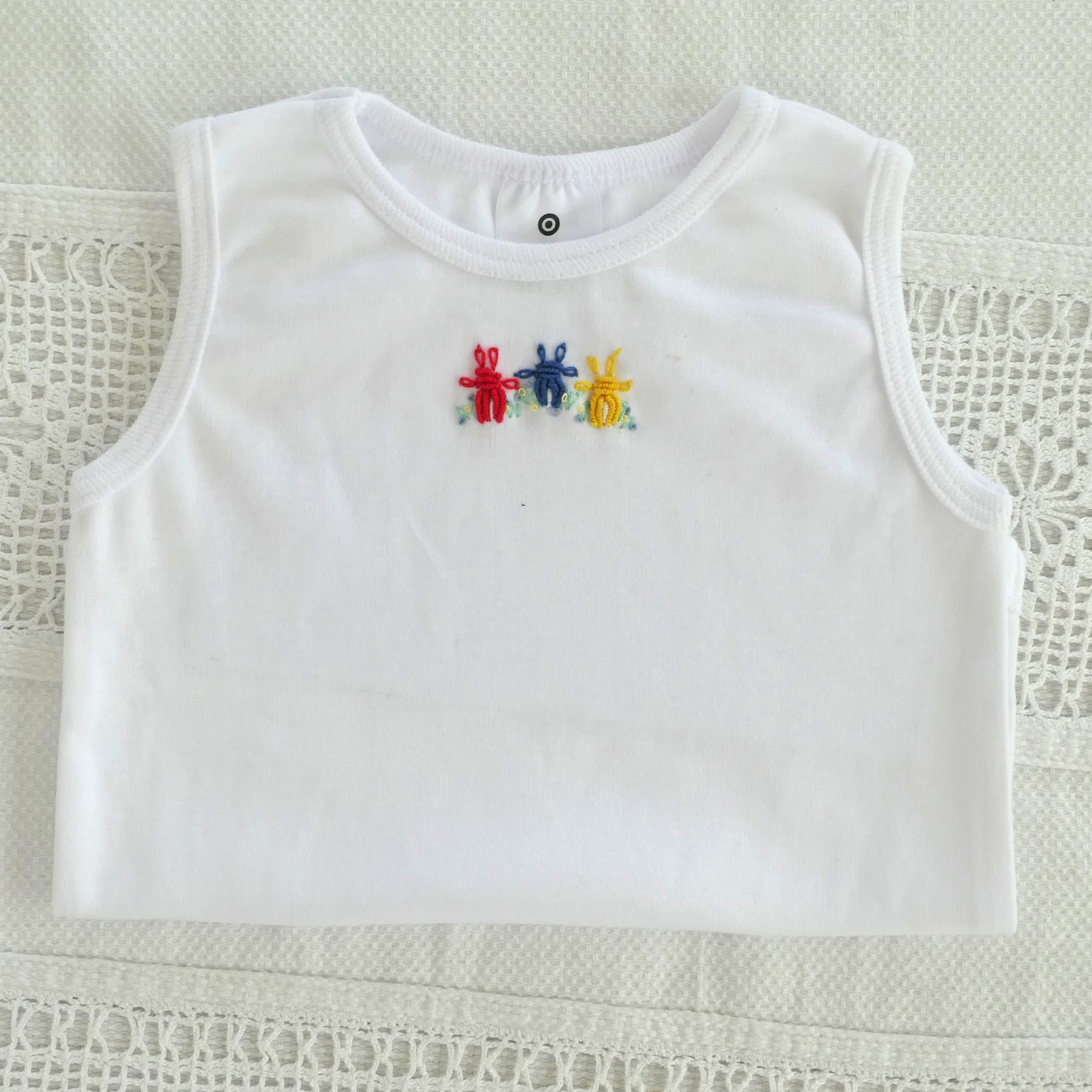 Singlets, body suits. Hand embroidered for babies. Free post.