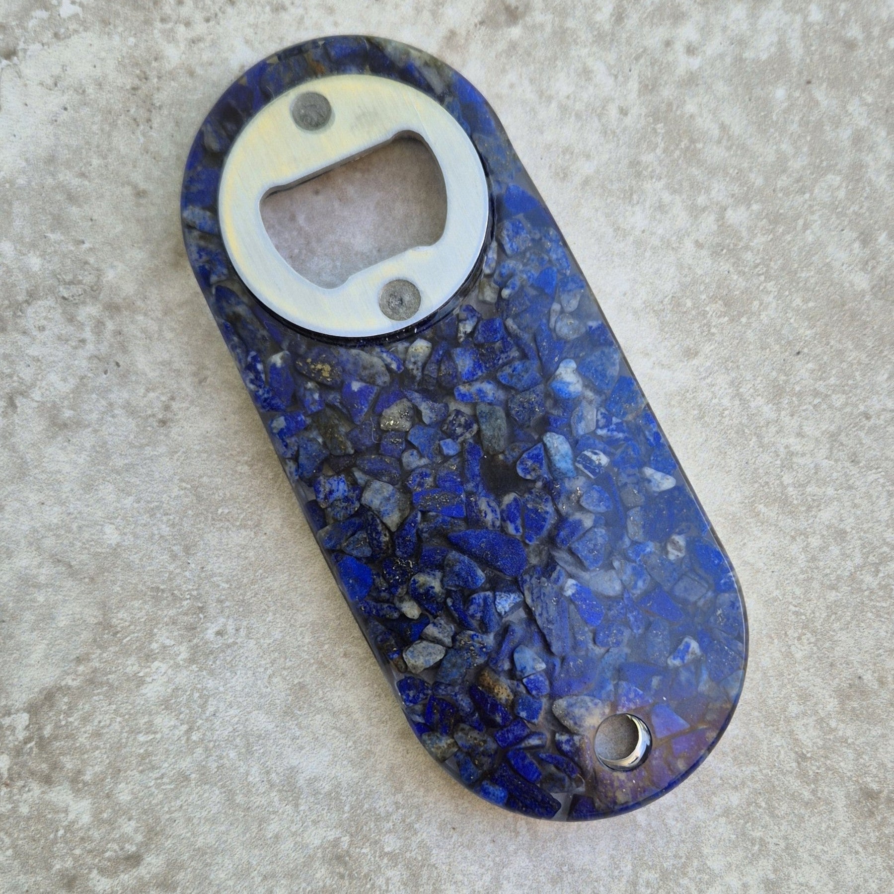 Resin bottle opener with inlaid semi-precious lapis lazuli