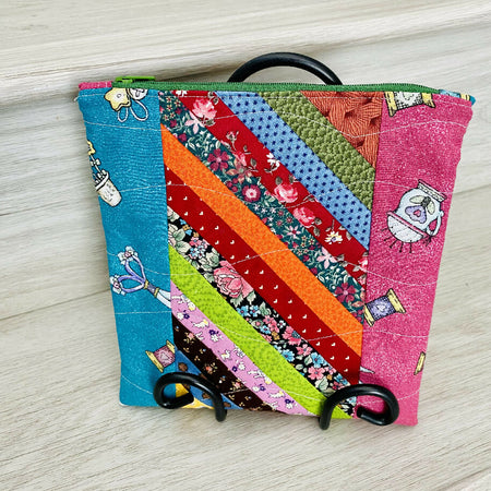 Strip pieced patchwork purse with side borders