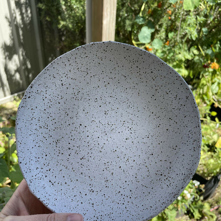 White speckled ceramic bowl