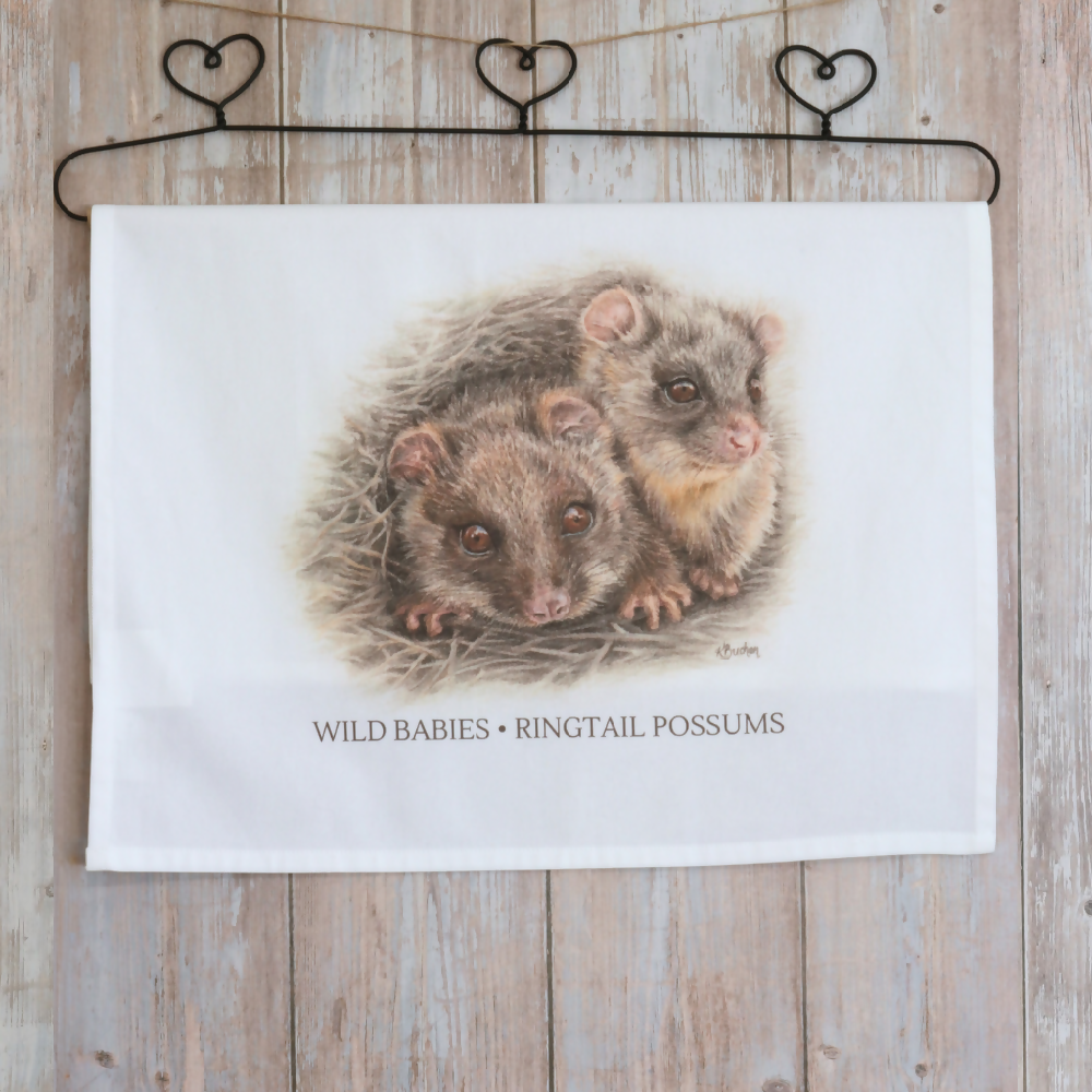 Australian-artist-illustration-ringtail-possums-tea-towel-front-hanging