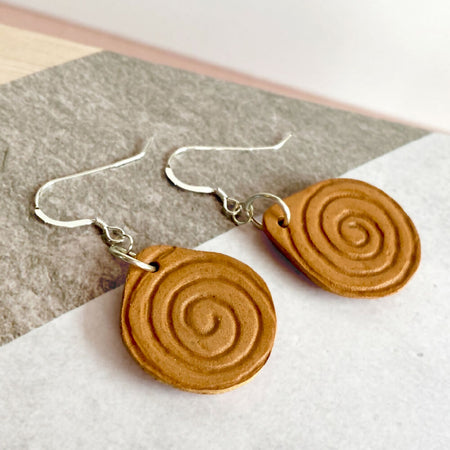 Spiral engraved leather dangle earrings