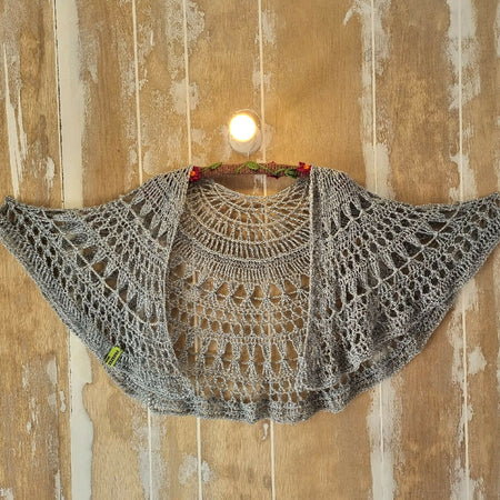 Crochet shawl made from recycled jeans yarn