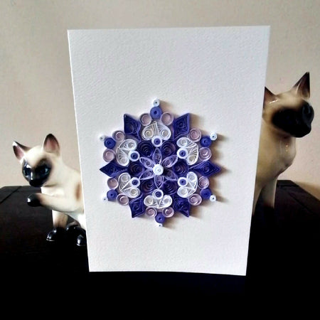 Handmade paper quilled mandala greeting card in purples