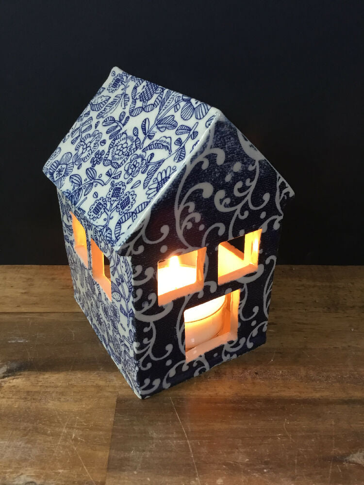 Pottery tea light house