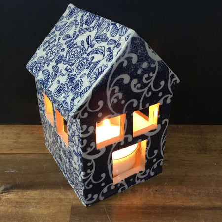 Pottery tea light house