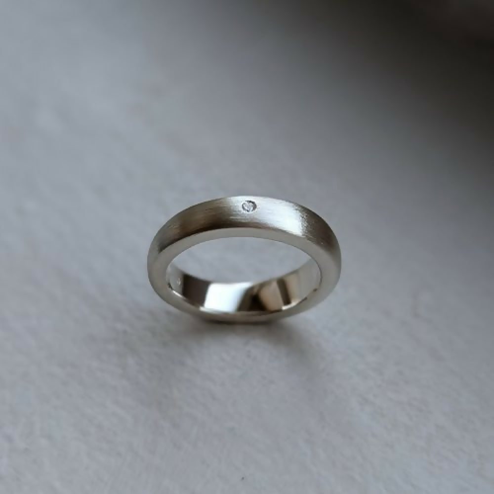 handmade offset ring × with diamond