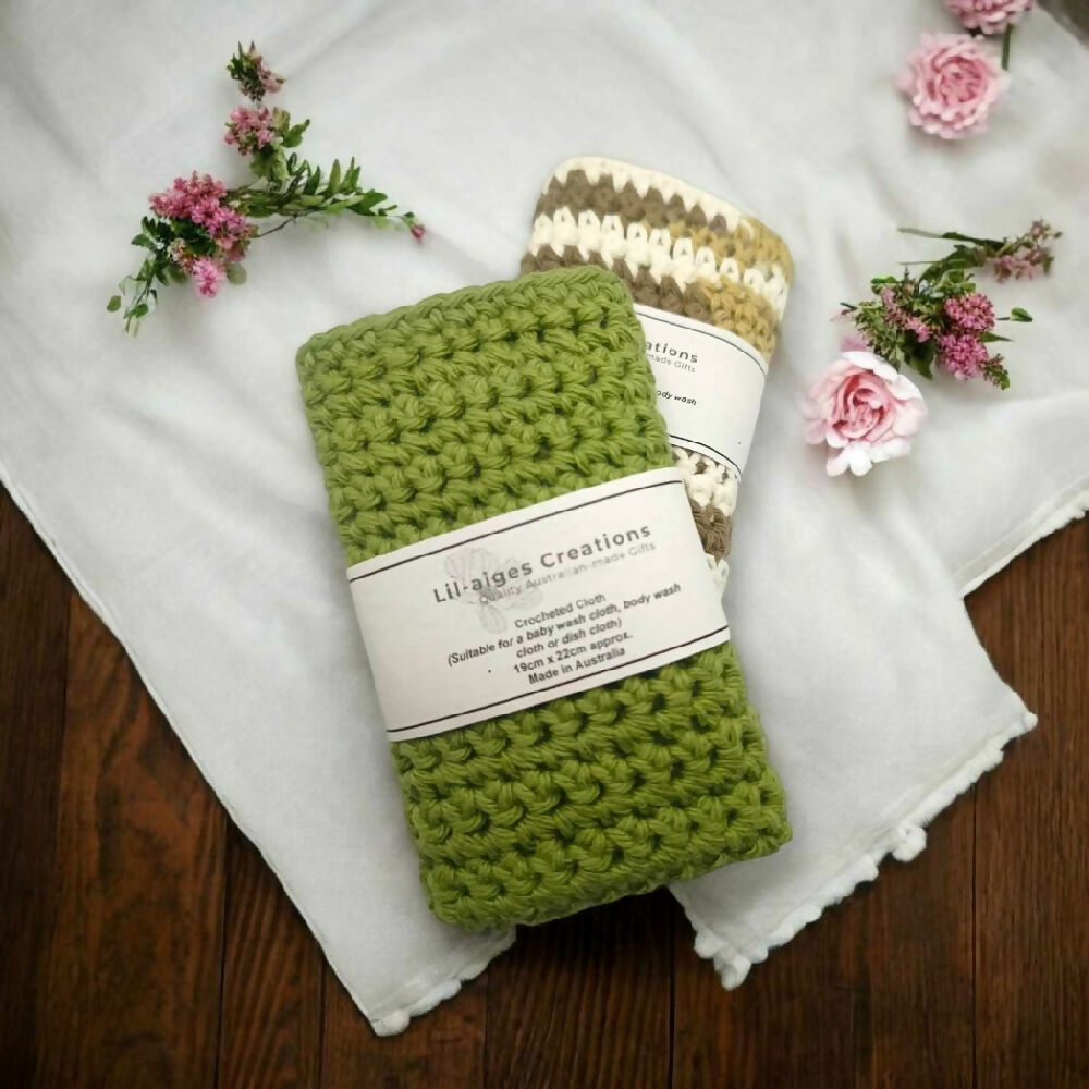 Sage Green & Chocolate Ombre Crocheted Cloths on a Dark Table with Flowers. Available to purchase singular or as a set of 2 - priced accordingly.