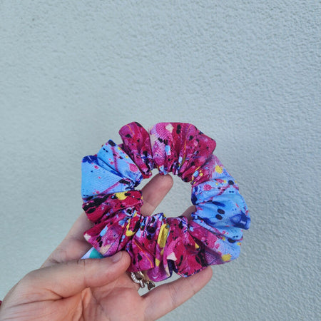 Bright and colourful splatter paint design scrunchie