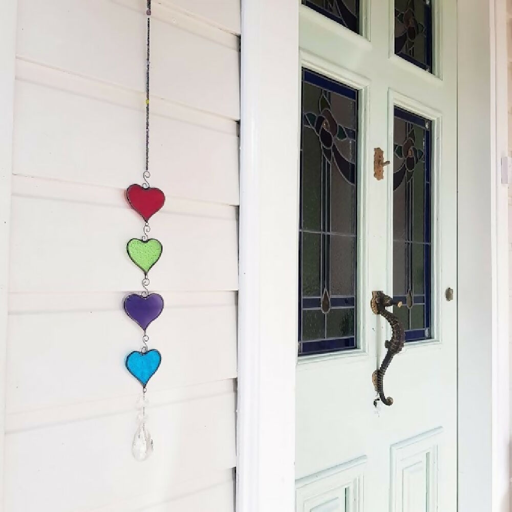 four colourful stained glass hanging hearts, hanging chain of hearts