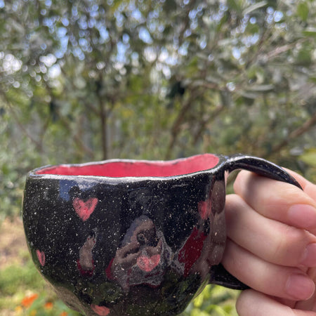 Hand built mug - pink hearts on black clay