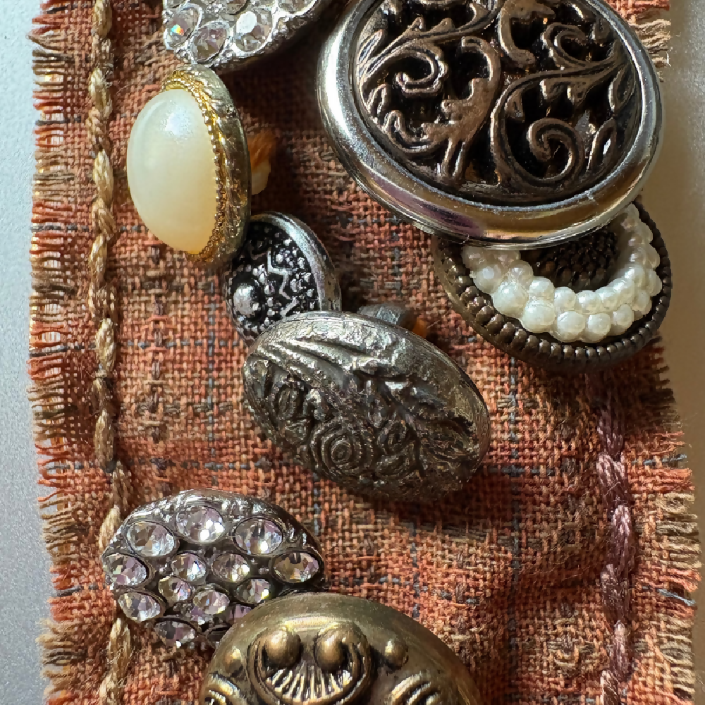 Buttoned and hand stitched brooch by Leumesin Handmade