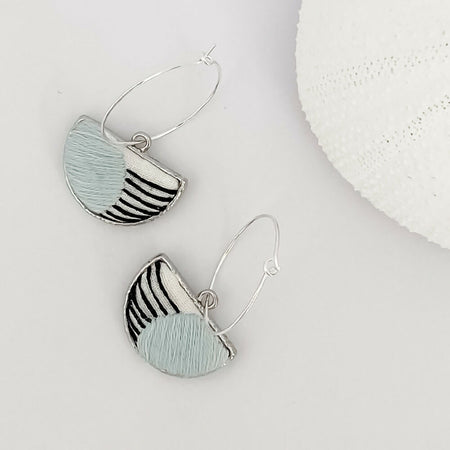 Modern hand-embroidered striped hoop earrings in silver