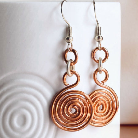 Copper and silver spiral two-tone dangle earrings