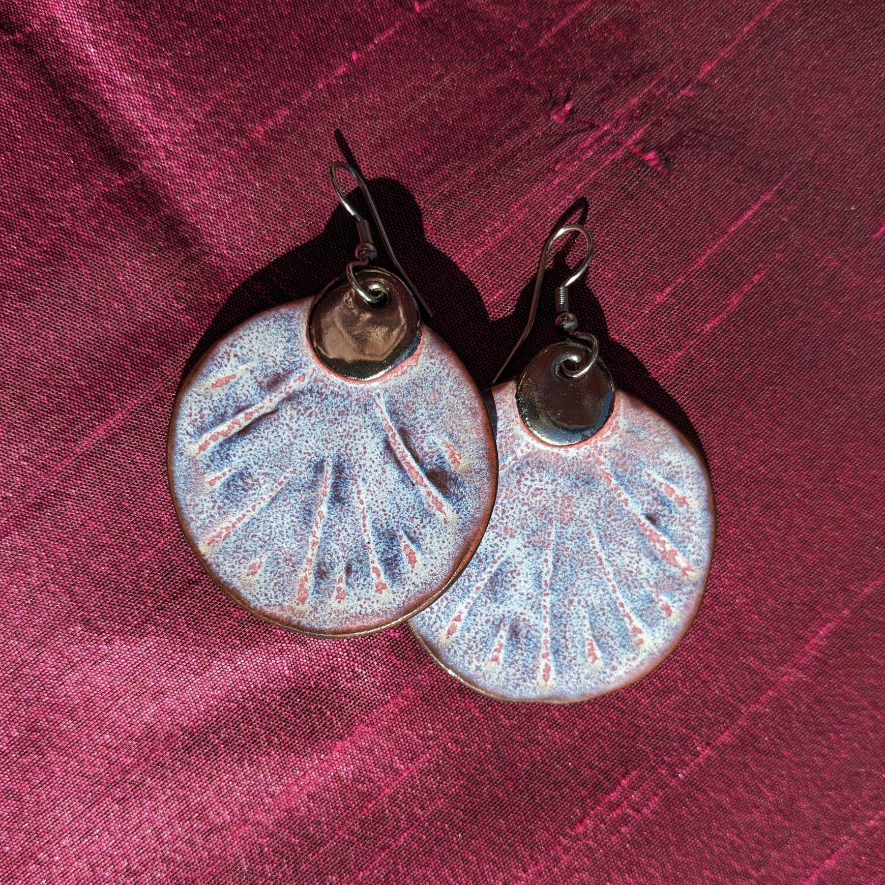 Ceramic earrings with platinum detail