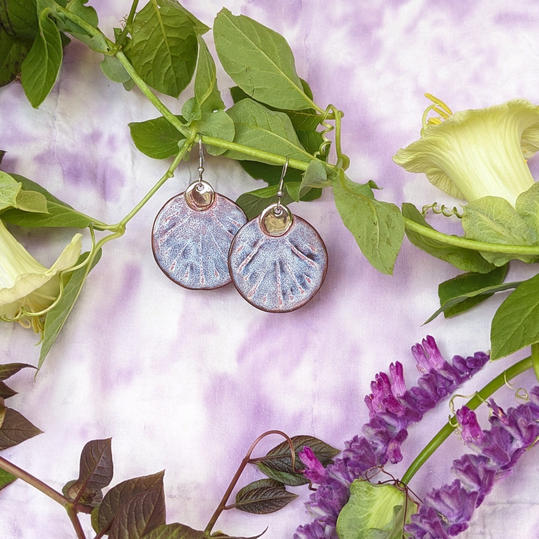 Ceramic earrings with platinum detail