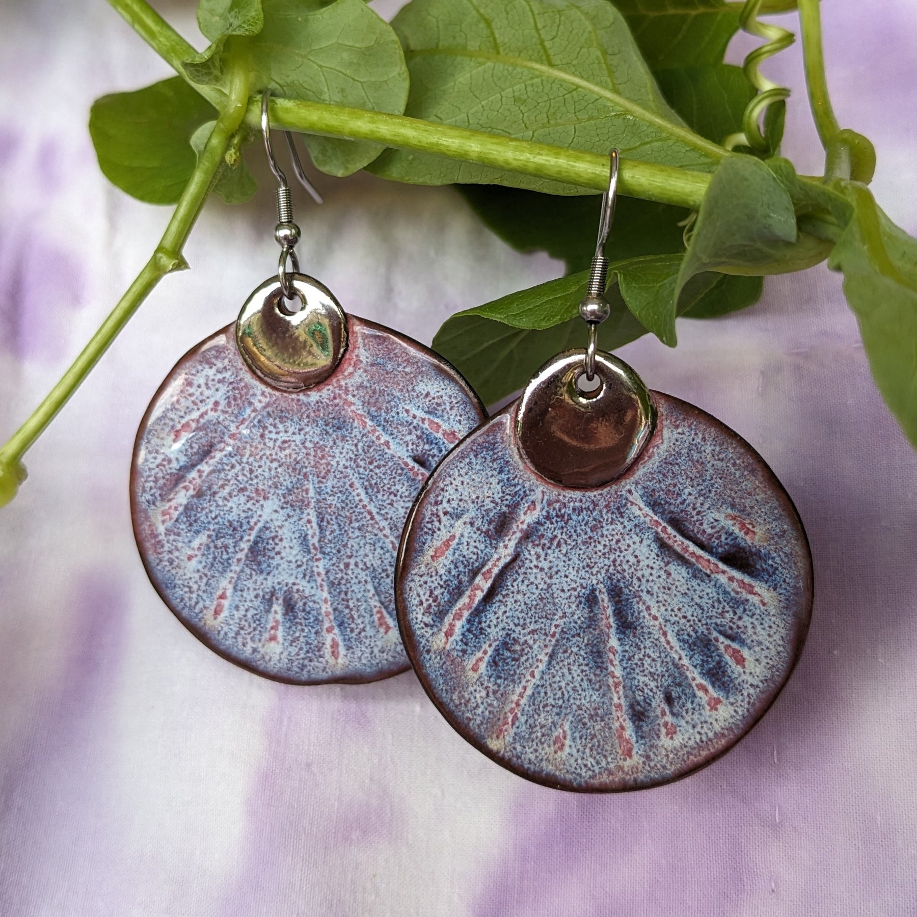 Ceramic earrings with platinum detail