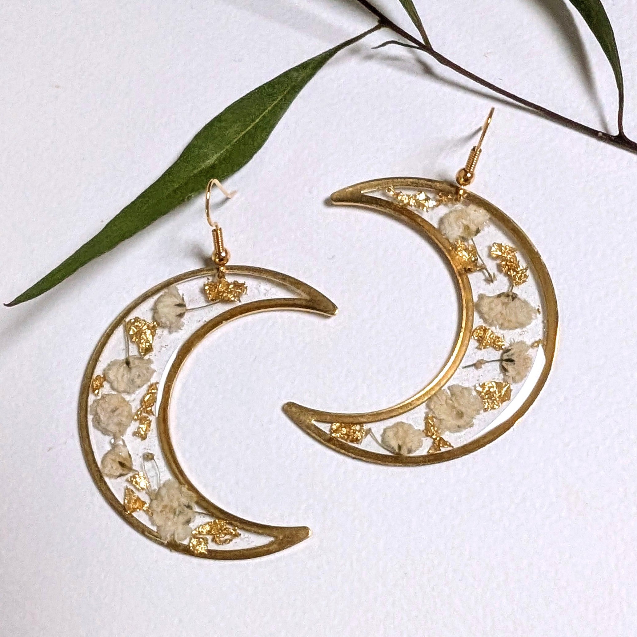 Large statement earrings, crescent moon, real flowers