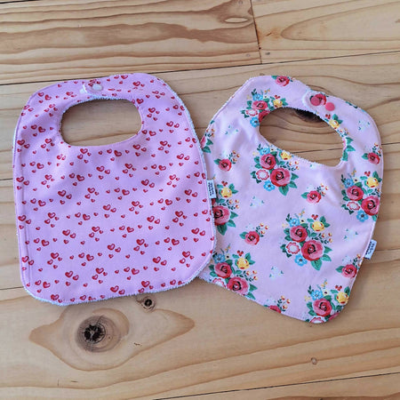 Set of Two Pink Bibs - Floral, Hearts