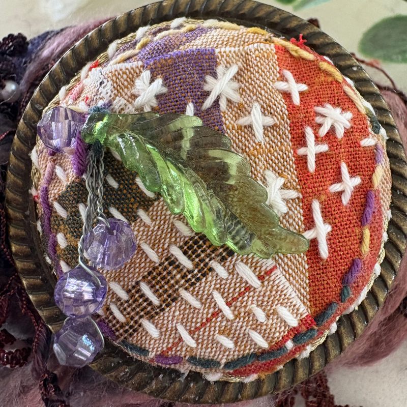 Boro inspired brooch in browns and greens