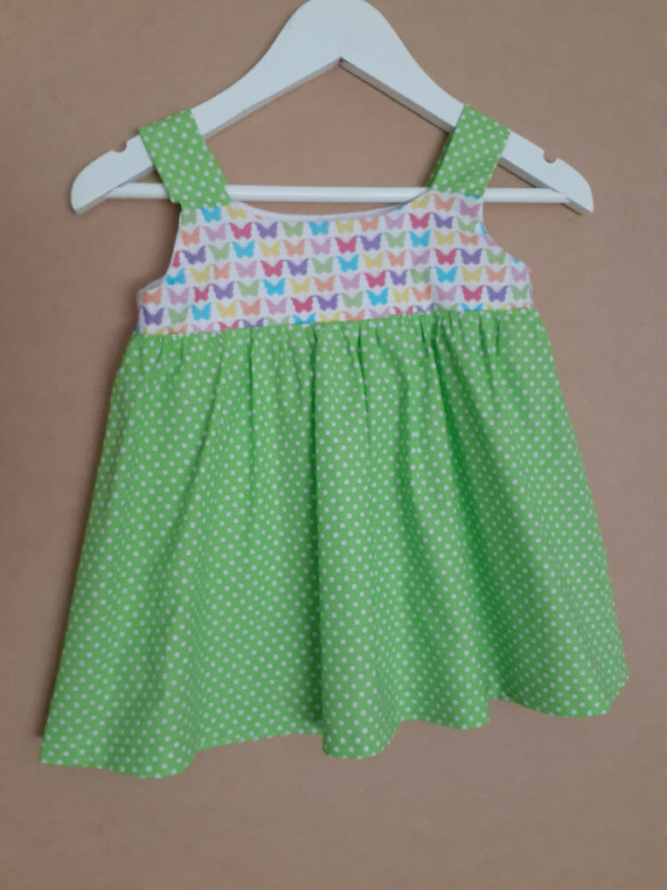 Cute child's dresses sizes 1-6. One-Of-A-Kind Print Bodice with Contrasting Spotty Skirt & Straps.