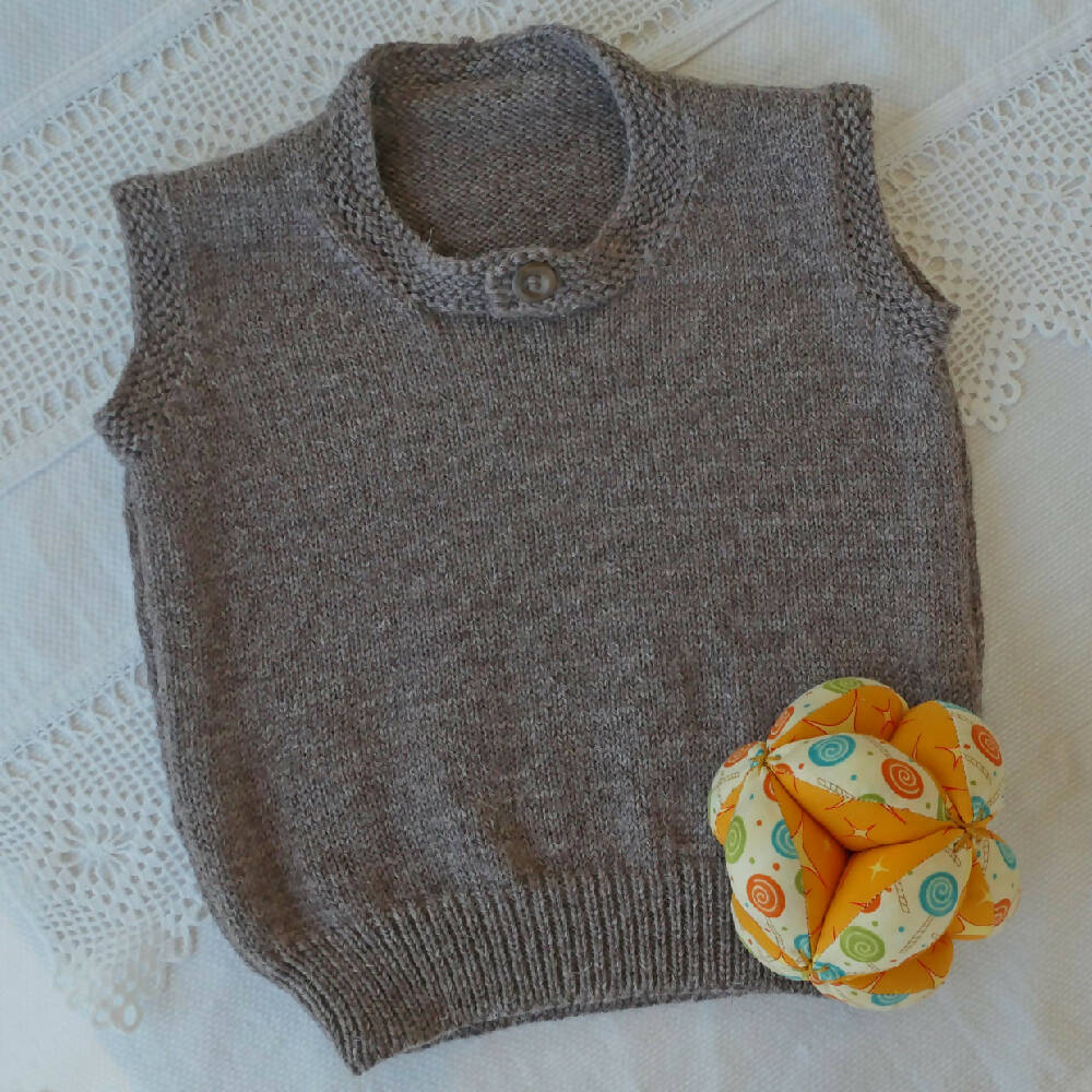 Hand knit sleeveless vest. wool, size 2. Free post