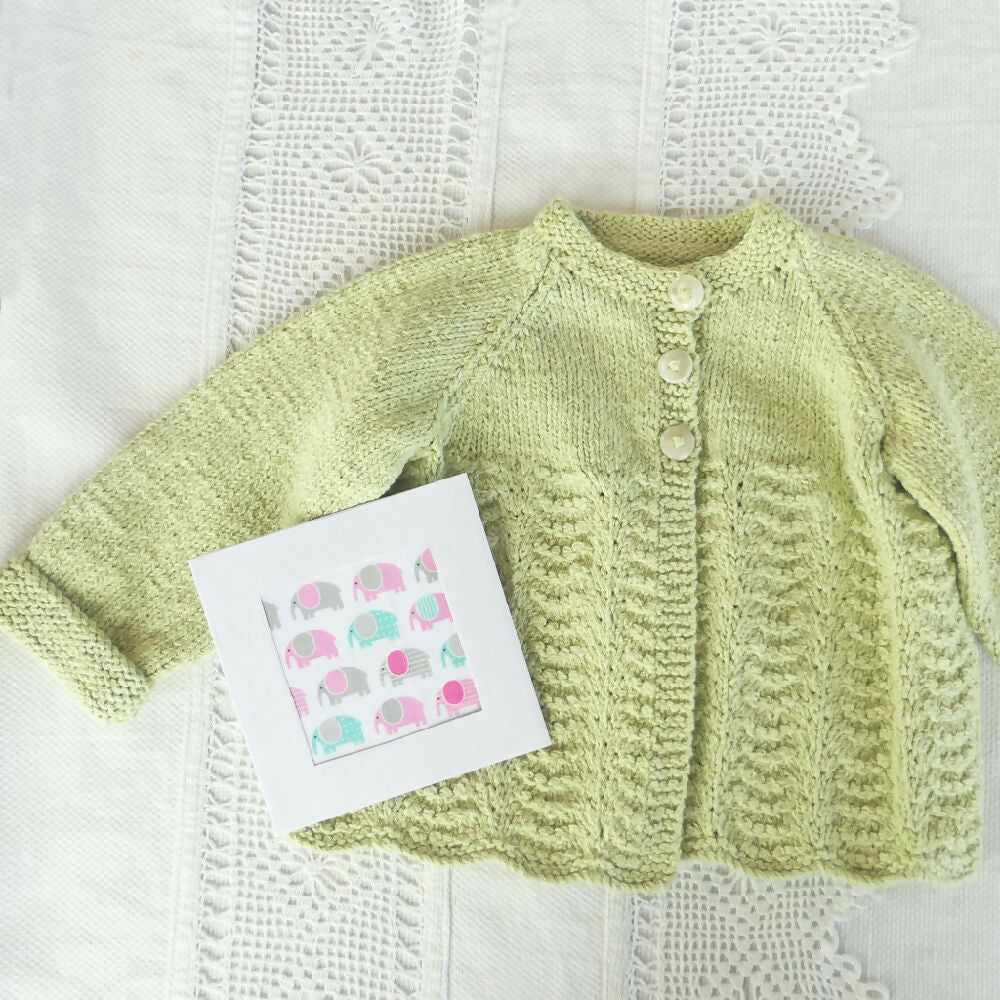 Pretty green cotton cardigan with "Sea Shell" lace pattern.