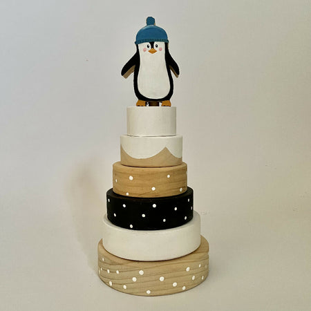 Ring stacker with penguin topper.