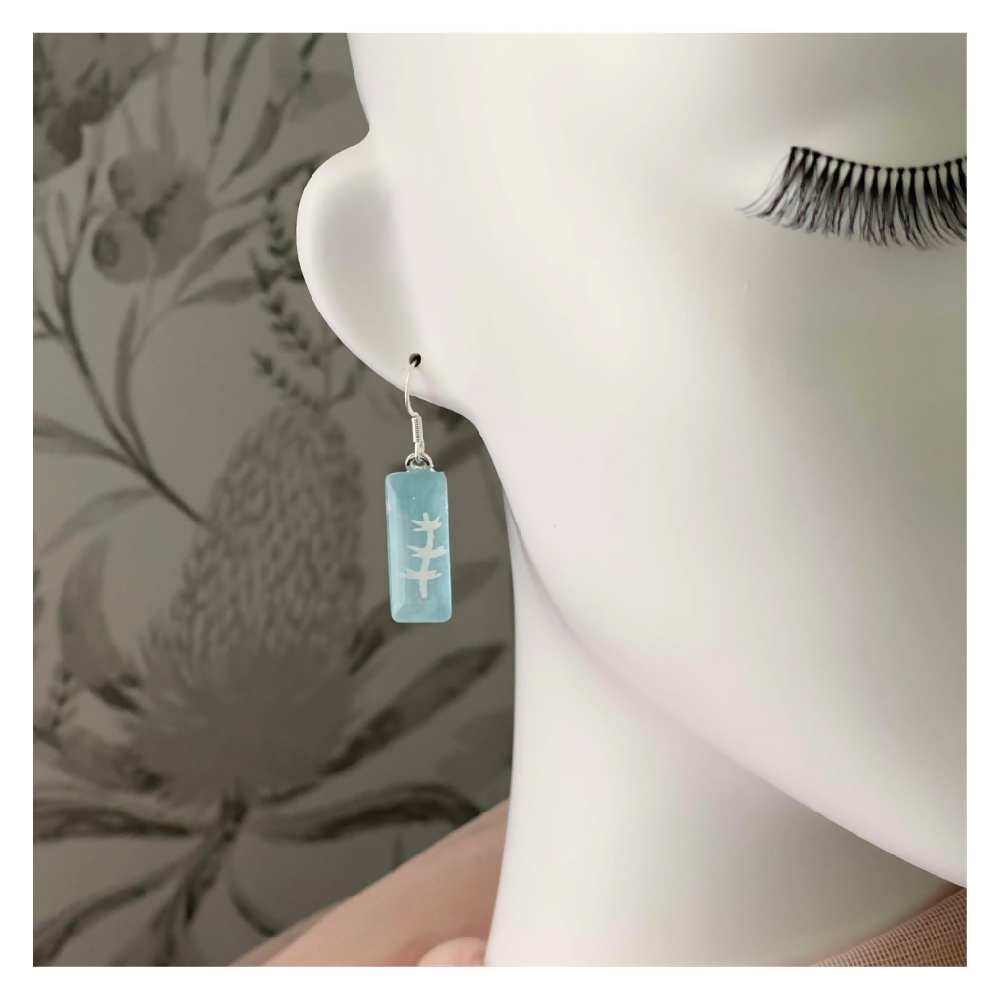 Light Blue Earrings with a White Sprig Pattern made with Washi, Glass and Resin