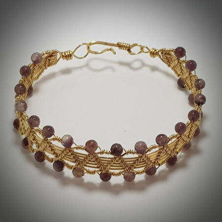 Amethyst beads and gold wire wrapped bracelet