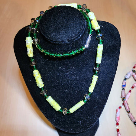 Beaded necklace. Green and yellow Tyvek beads and Swarovski crystals