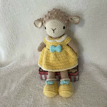 Lamb in yellow dress