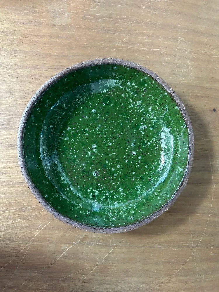 Green pottery bowl