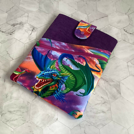 Colourful Dragons Book Sleeve. IPad/Tablet pouch. 2 pockets with flap closure.