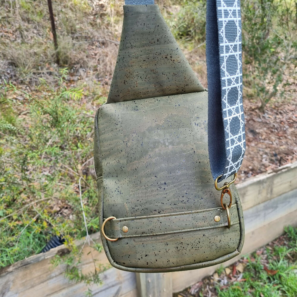 Rear view of sling style unisex cork bag