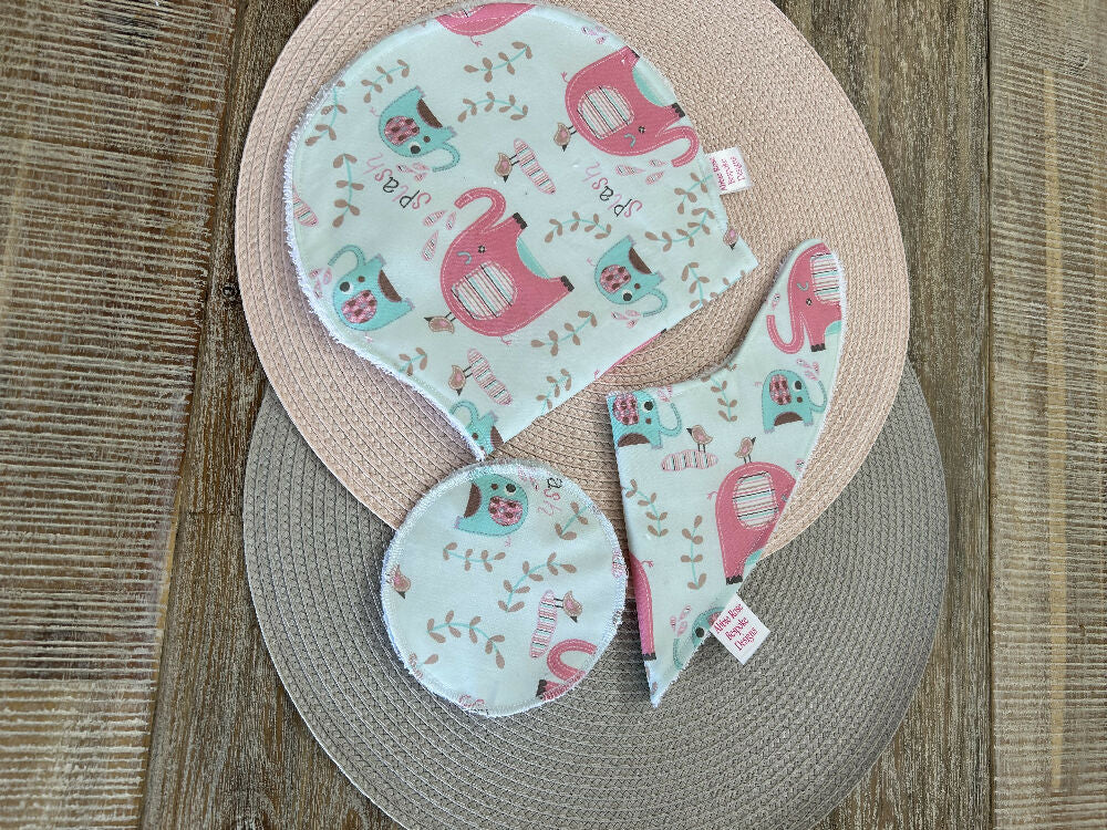 Bib, Burp cloth and reusable breast pad set