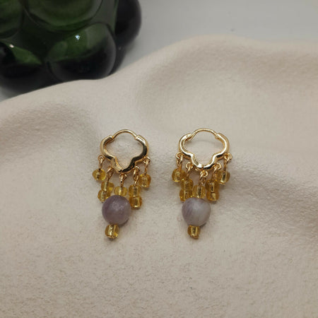 Beaded earrings in Gold and purple