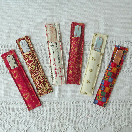 Christmas fabric pouch and double sided nail file. Kris Kringle