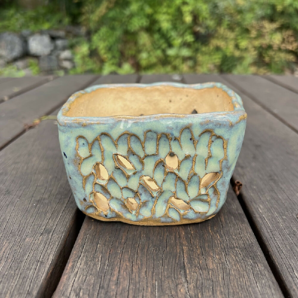 Square pot turquoise outdoors