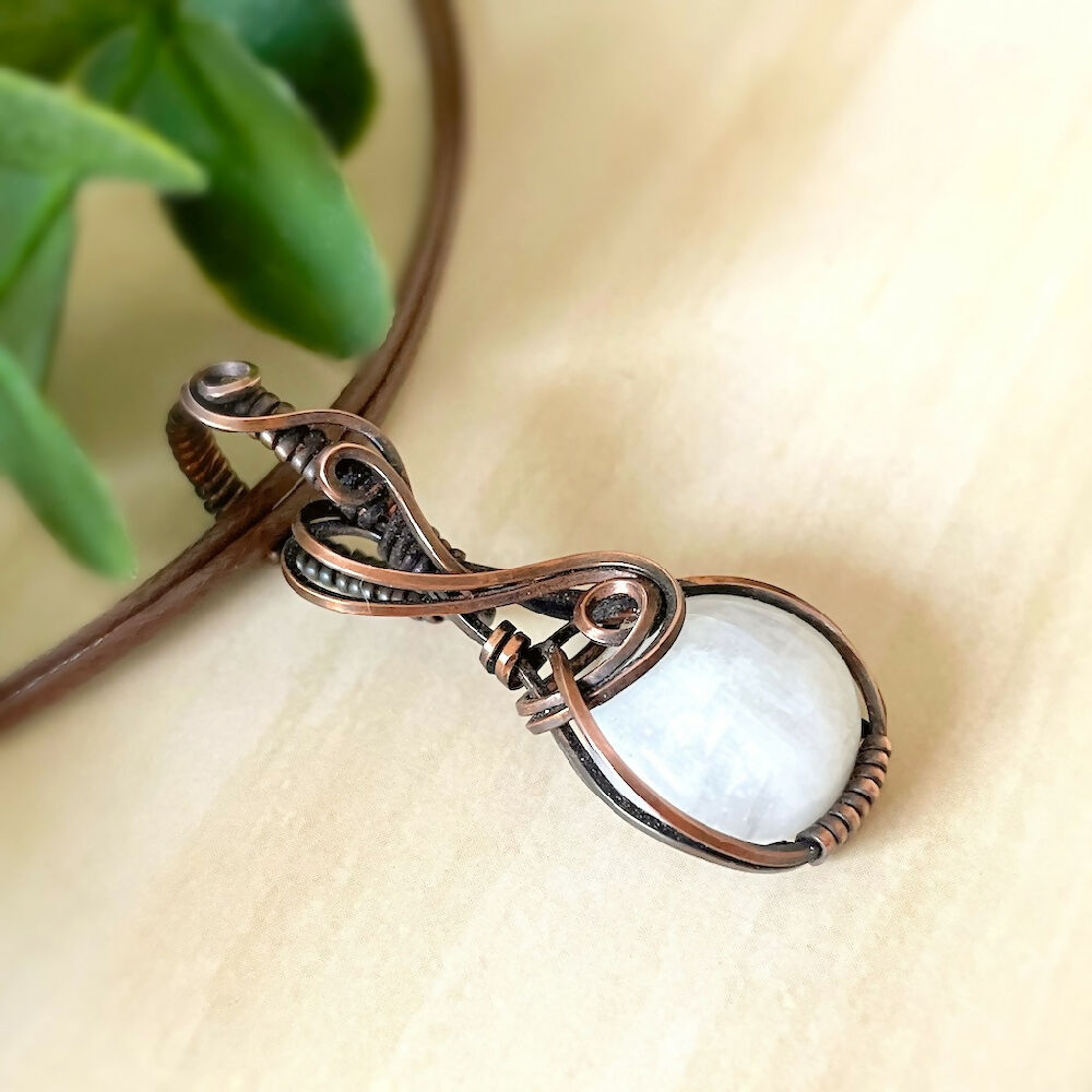 Captivating 47x17mm Wire-Wrapped Rainbow Moonstone Pendant