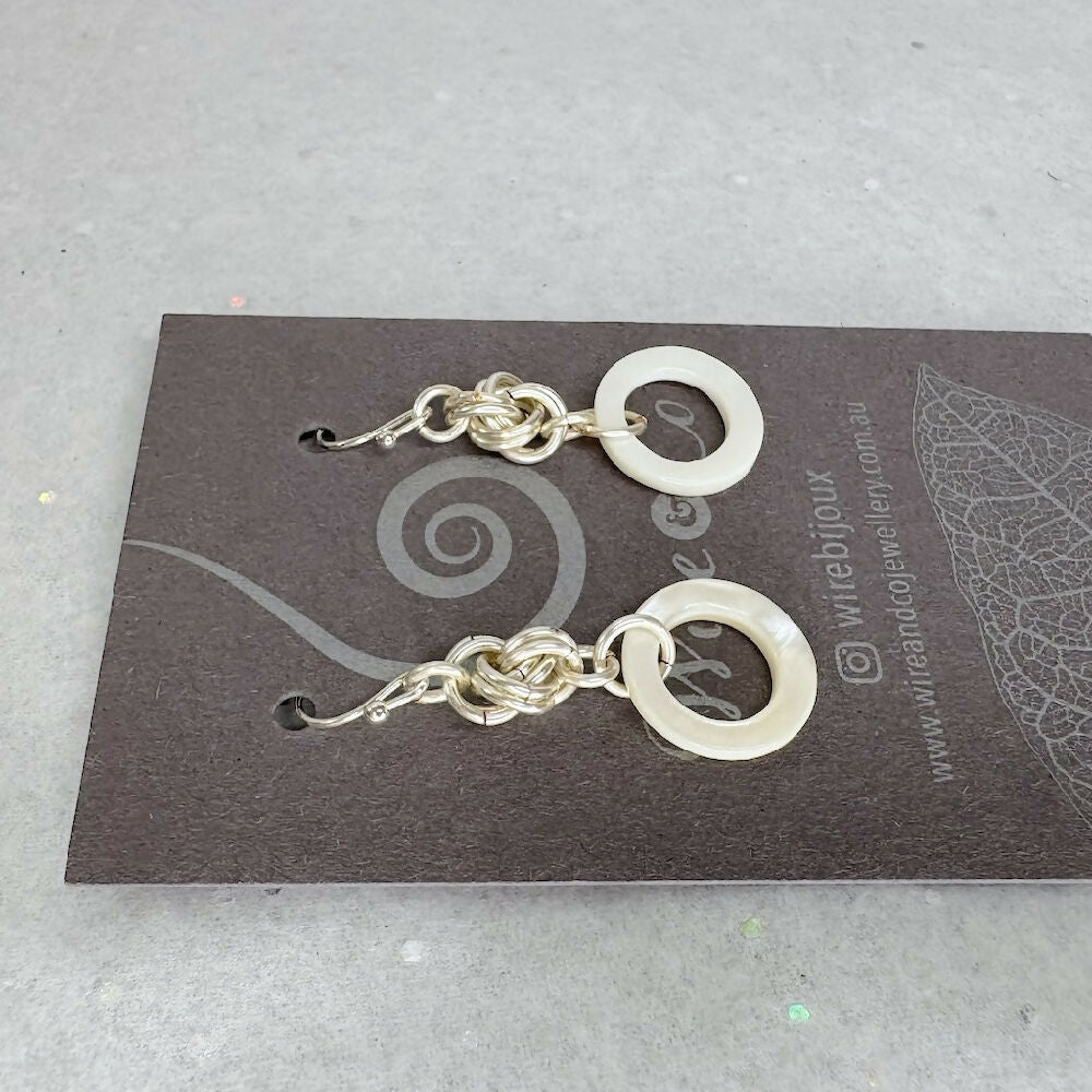 Love knot earrings mother of pearl detail