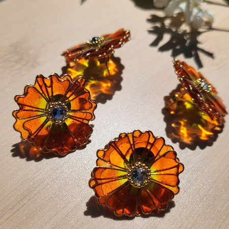 Orange resin flowers earrings