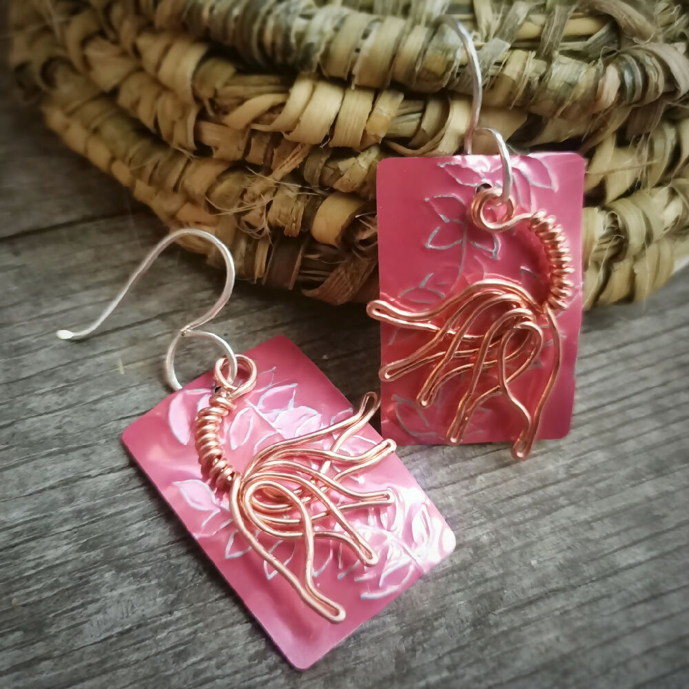 pink upcycled drink can earrings with copper flower dangle