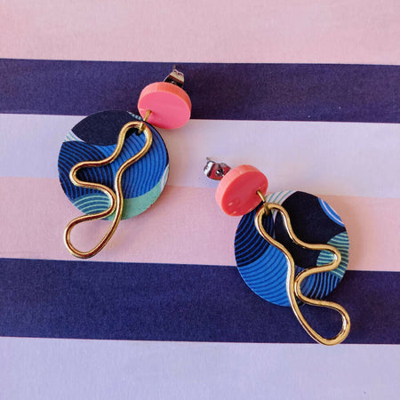 Blue shades with gold squiggle earrings